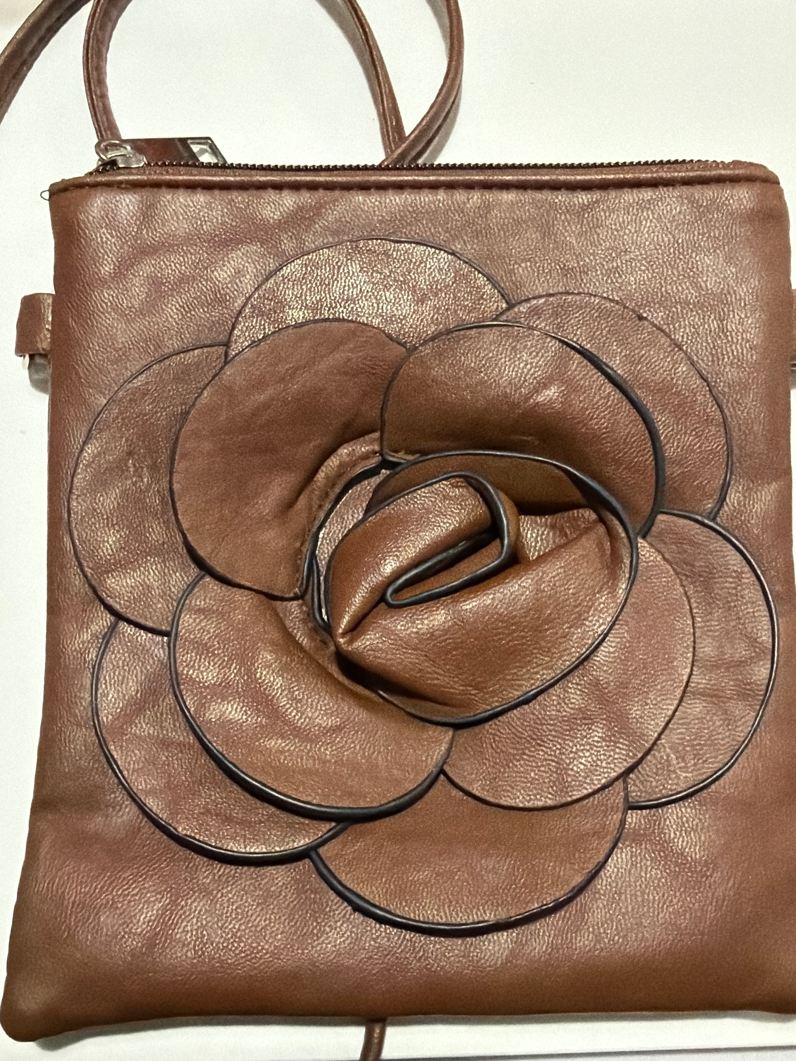 Brown leather crossbody bag with 3D rose flower appliqué